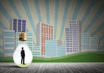 Businessman trapped in bulb