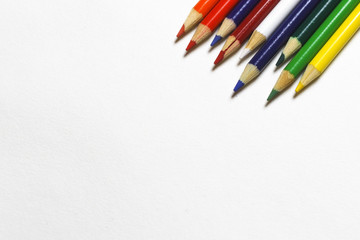 Coloured pencils on a white background