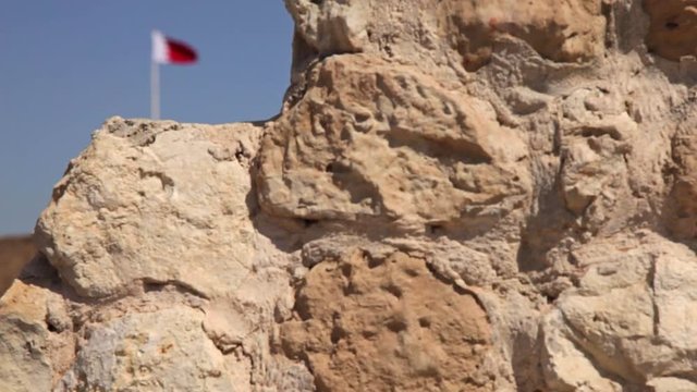 Arad Fort. Ancient wall and Flag. Bahrain for stb
