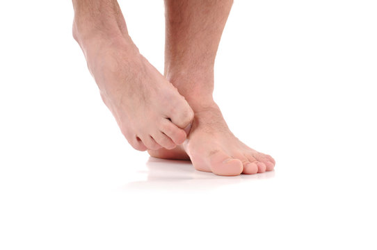 Man scratch the itch.  Infection of the feet caused by fungus.