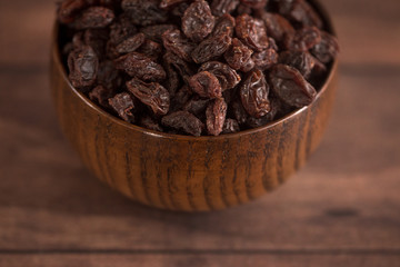 Raisins in a Wooden Bowl