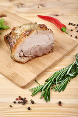 baked pork with salad and spices