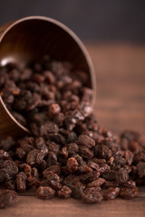Raisins in a Wooden Bowl