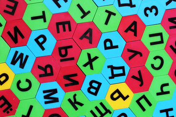 Children's colored mosaic with Russian letters, top view
