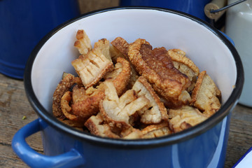 closeup with  delicious fried bacon in a pot