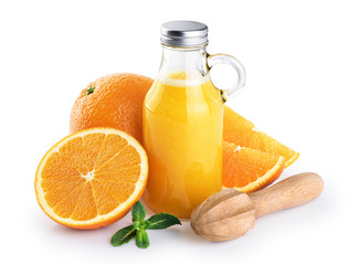 Bottle with orange juice, oranges, squeezer and mint isolated on white background.