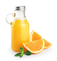 Bottle with orange juice, oranges and mint isolated on white background.