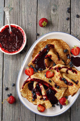 Ruddy pancakes with berries