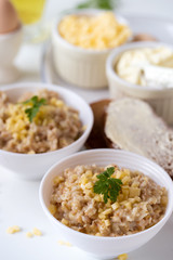 Porridge with butter and cheese