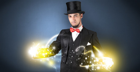 Magician holding his power on his hand