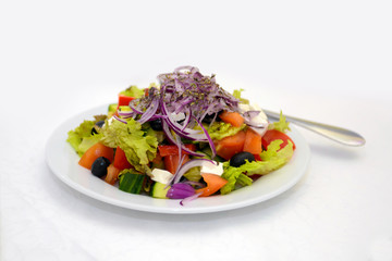 Salad of vegetables on the table. Vegetarian diet food. 