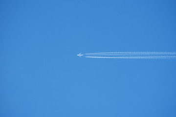 An airplane with contrails