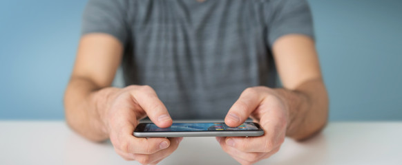 Businessman using modern mobile phone