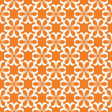 White floral seamless pattern on orange background © Liudmyla