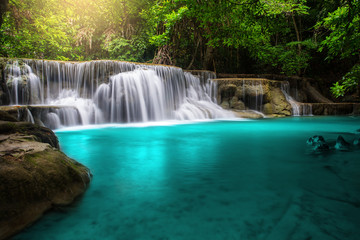 Fototapeta na wymiar Huay Mae Kamin Waterfall, beautiful waterfall in rainforest at Kanchanaburi province, Thailand