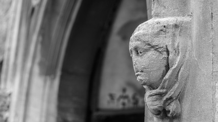 Corbel Head on St John Church in Bristol B, Architecture Details, black and white shallow depth of field horizontal photography © Jacek Wojnarowski