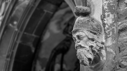 Corbel Head on St John Church in Bristol D, Architecture Details, black and white shallow depth of field horizontal photography © Jacek Wojnarowski