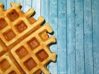 Homemade Belgian waffles. Top view with free copy space