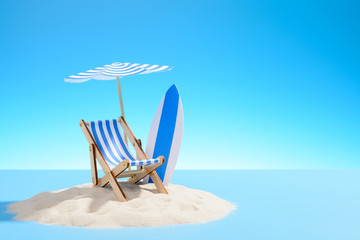 The concept of a tropical vacation. A chaise longue under an umbrella and surfboard on the sandy island. Sky with copy space