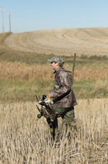 A Duck Hunter with a Drake Mallard in Norh Dakota
