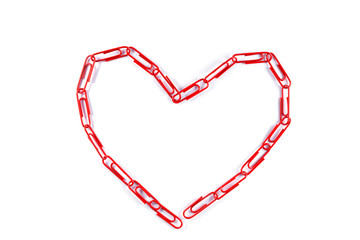 Series of colorful paper clips on a white background with copy space.