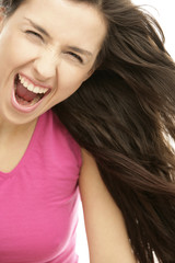 Young aggressive woman screaming