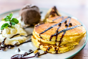 Pancake with chocolate ice-cream.