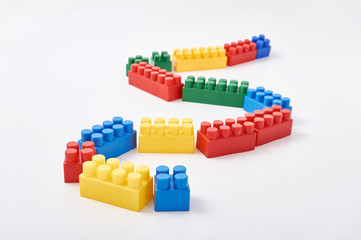 Colorful cubes of designer on white background.