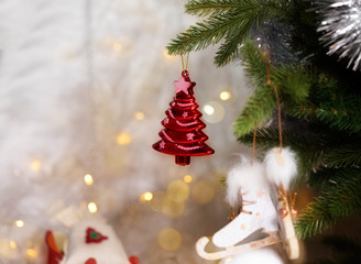 Winter holidays background: Christmas decoration on Christmas tree.