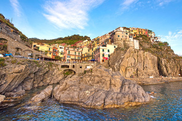 Fototapeta na wymiar Beautiful colorful summer landscape on the coast of Manarola in Cinque Terre, Liguria, Italy, Europe
