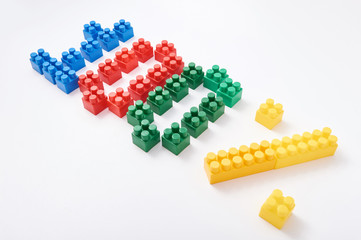 figures from a colored cubes designer on a white background