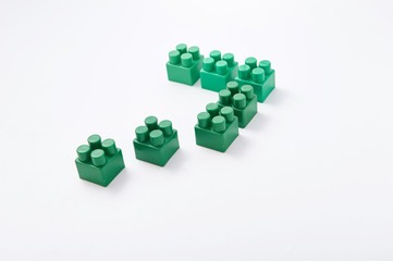 figures from a colored cubes designer on a white background