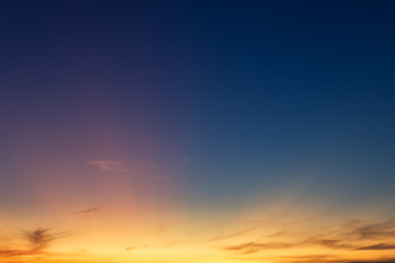 Beautiful fluffy clouds with evening sunset background.