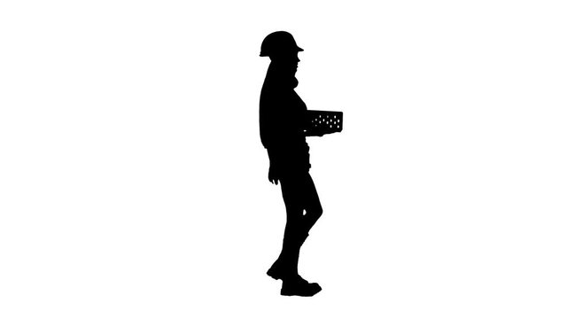 Builder girl carries a brick and thrumbs up . Silhouette. White background . Side view