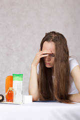Young lady with long straight hair close to the kit hair care