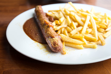 Tasty german sausage served with sauce