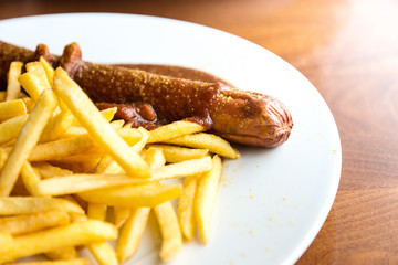 Tasty german sausage served with sauce