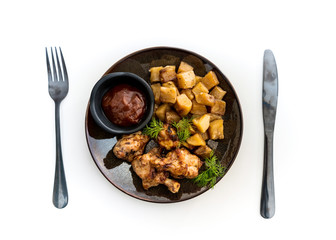 roasted sleeves chicken with potatoes and barbecue sauce