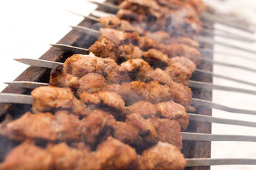 Shish kebab fry on the grill in winter