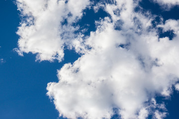 Obraz premium Big white clouds on beautiful blue sky