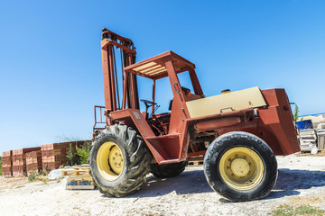 Old forklift in a construction site in Sicily, Italy