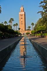 Fototapeta premium Reflection in a fountain water of Koutoubia mosque at sunset, Marrakech, Morocco, North Africa