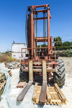 Old Forklift In A Construction Site In Sicily, Italy