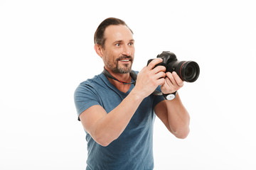 Cheerful mature man photographer