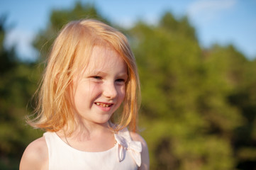 Portrait of a girl lit by the setting sun