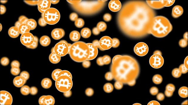 Bitcoin cryptocurrency coins background. Seamless looping animation of flying bitcoin coins with depth of field over black background