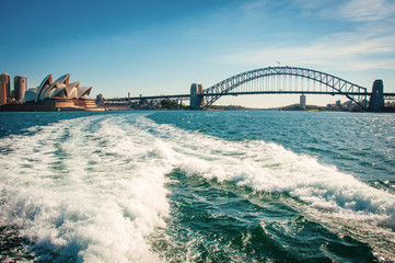 The city skyline of Sydney, Australia. Circular Quay and Opera House. Retro filter