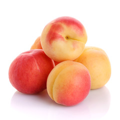 Close-up view of fresh peaches isolated