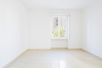 Obraz premium Empty room, clean white walls after renovation