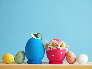 Funny Easter eggs on bright background